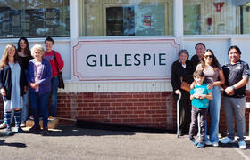 Gillespie family members  and the new Gillespie building sign